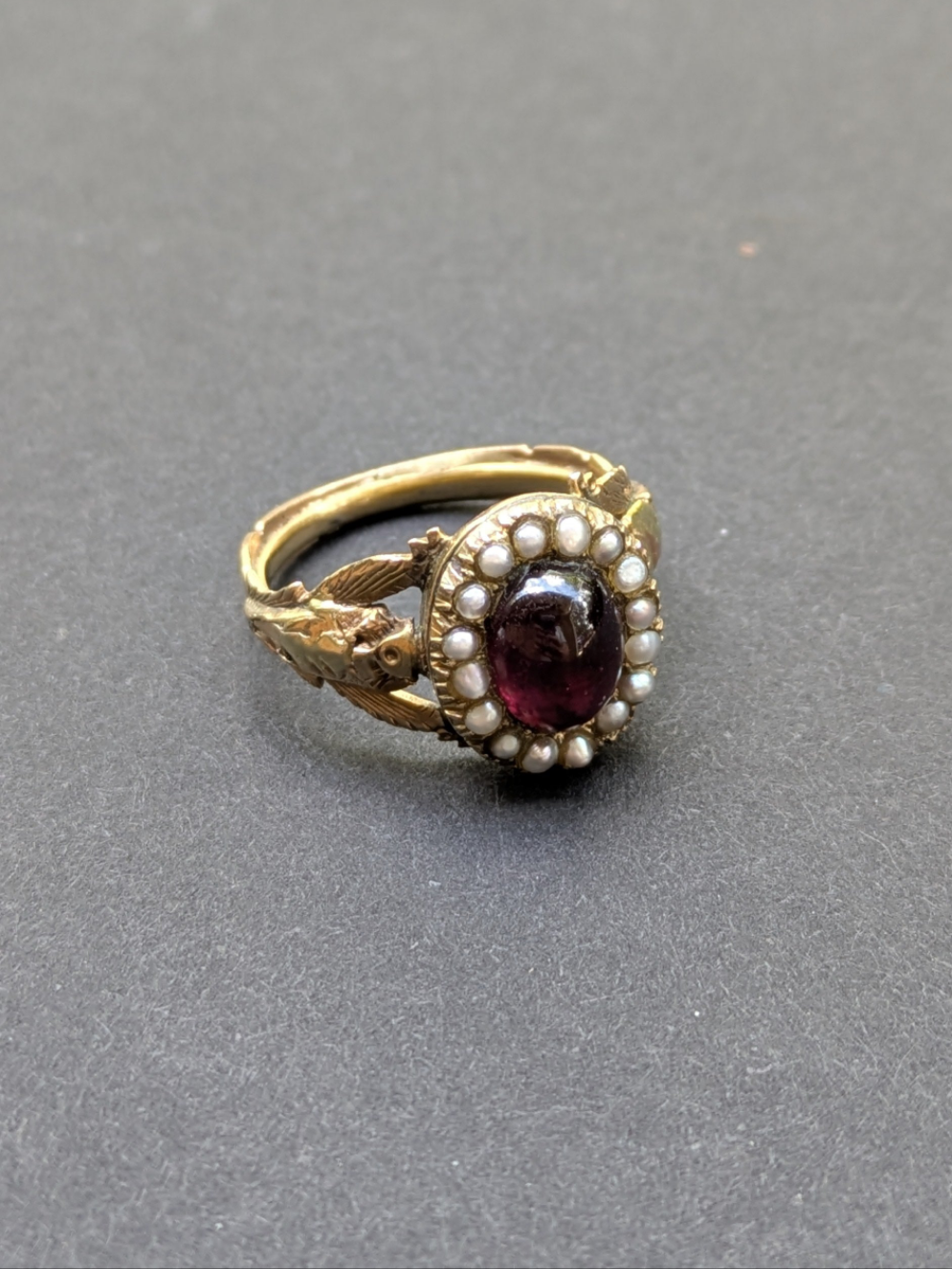 Foil Backed Garnet and Seed Pearl Ring with Floral Shoulders