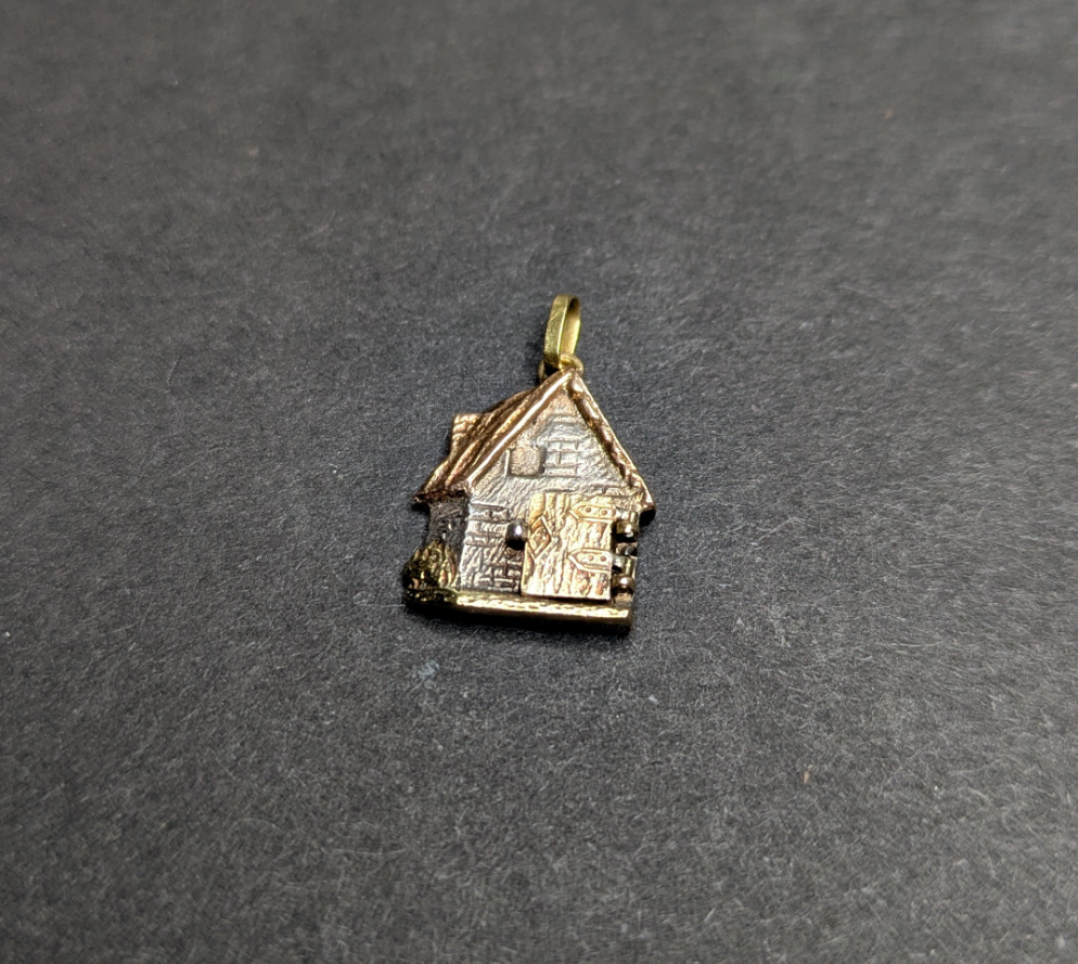 Silver and Gold Cabin with Door that Opens to a Heart