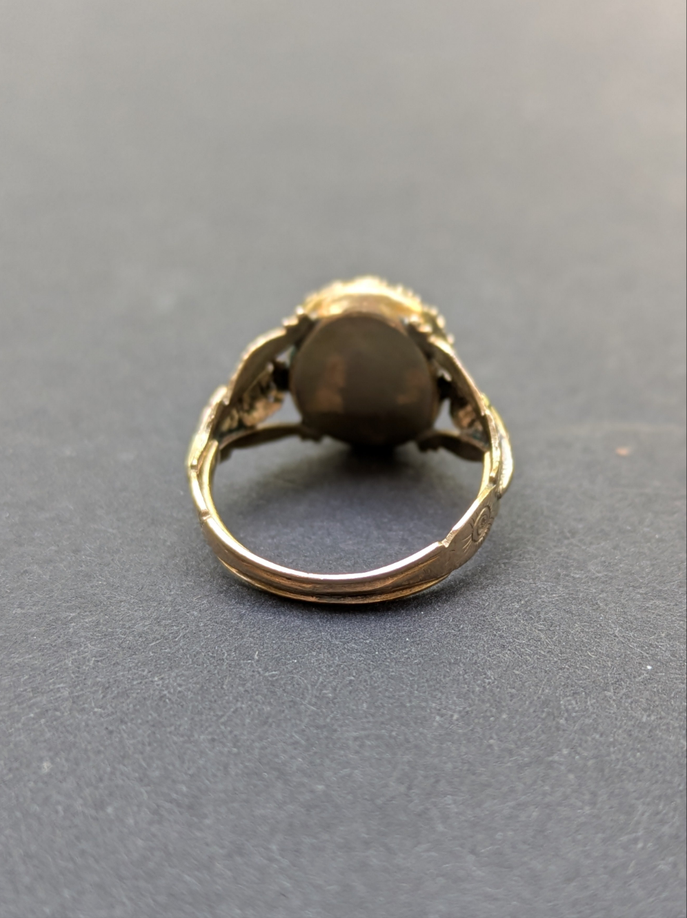 Foil Backed Garnet and Seed Pearl Ring with Floral Shoulders