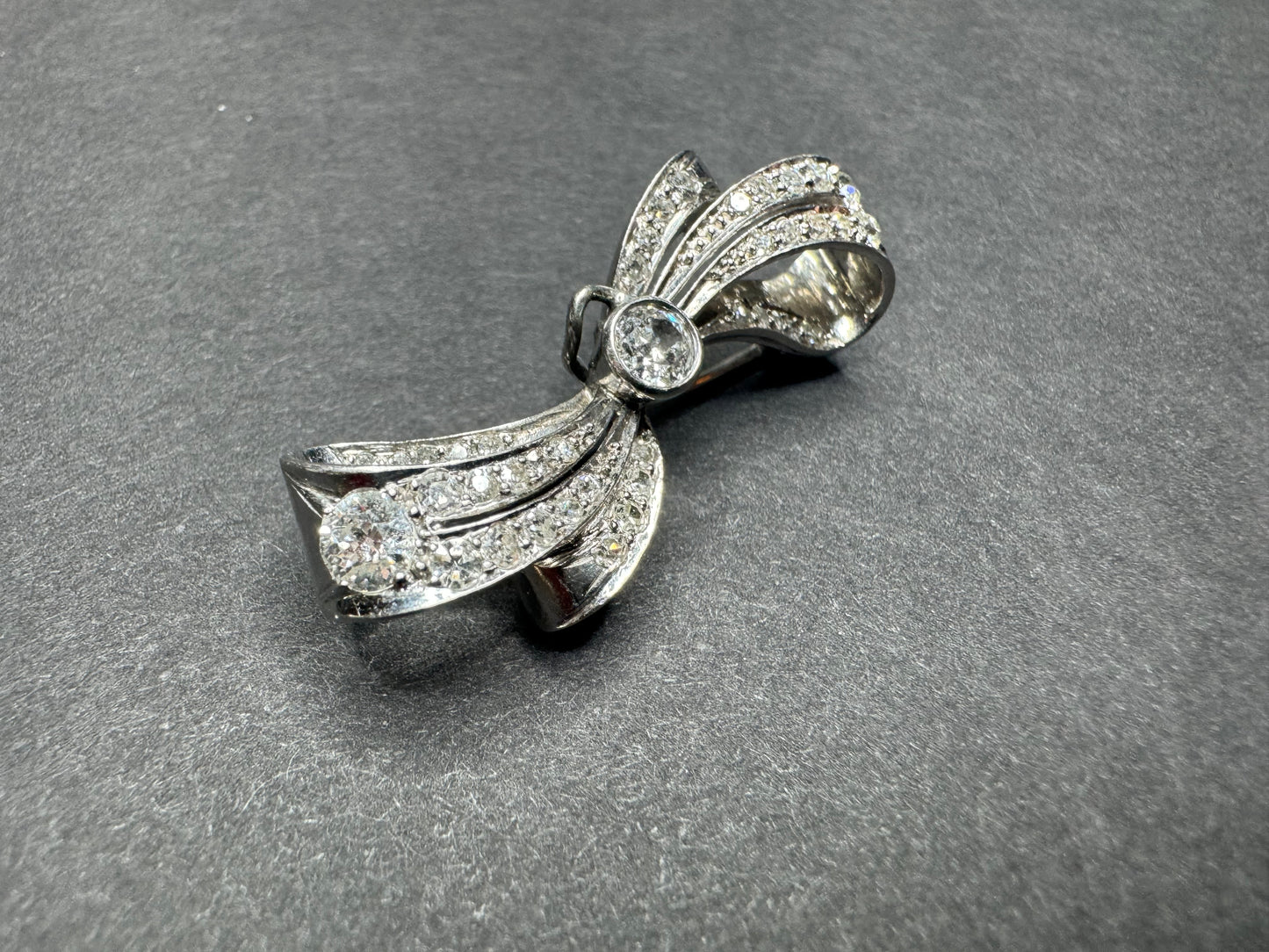 Edwardian Platinum and Old European Cut Diamond Bow Brooch