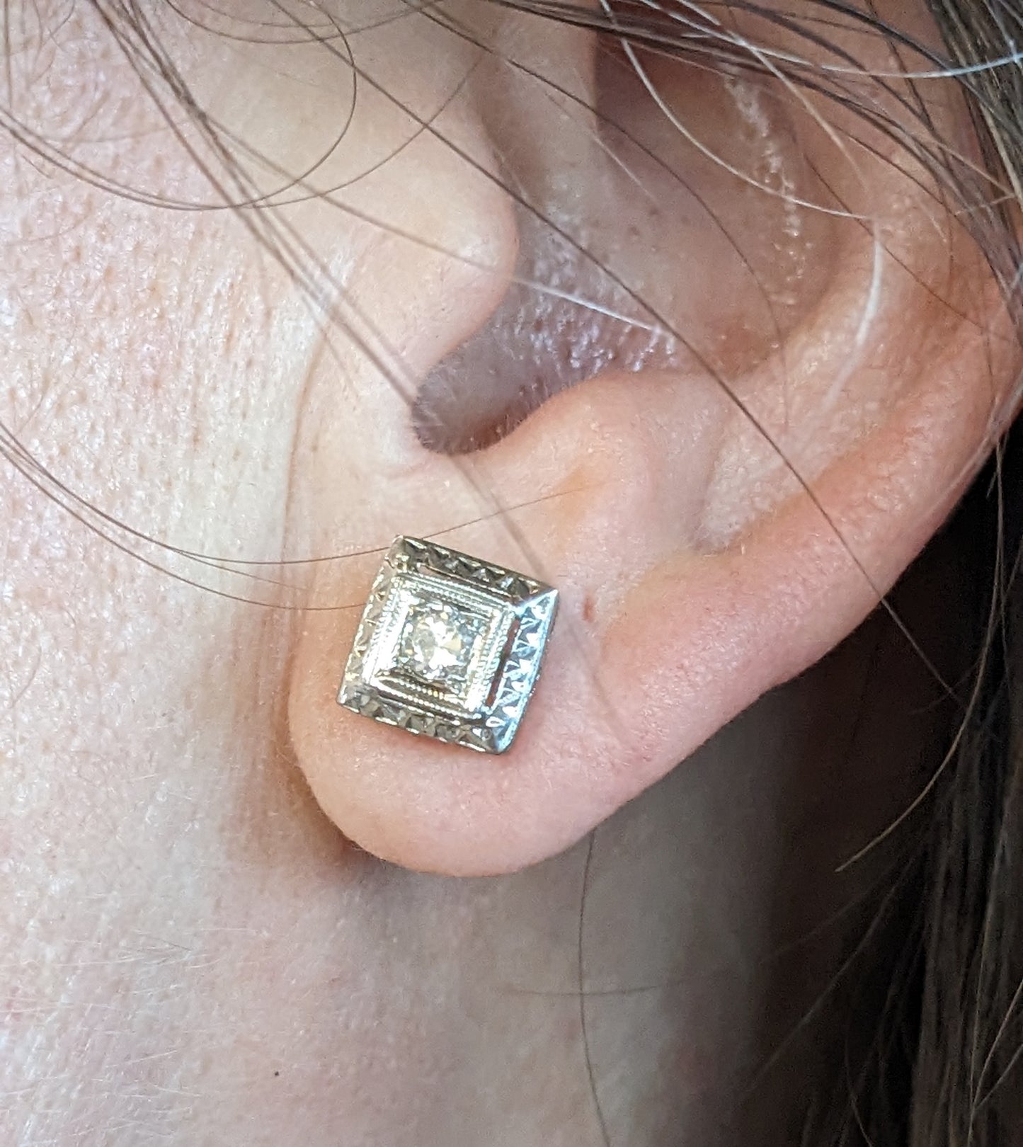 Square mounted round Diamond stud earrings