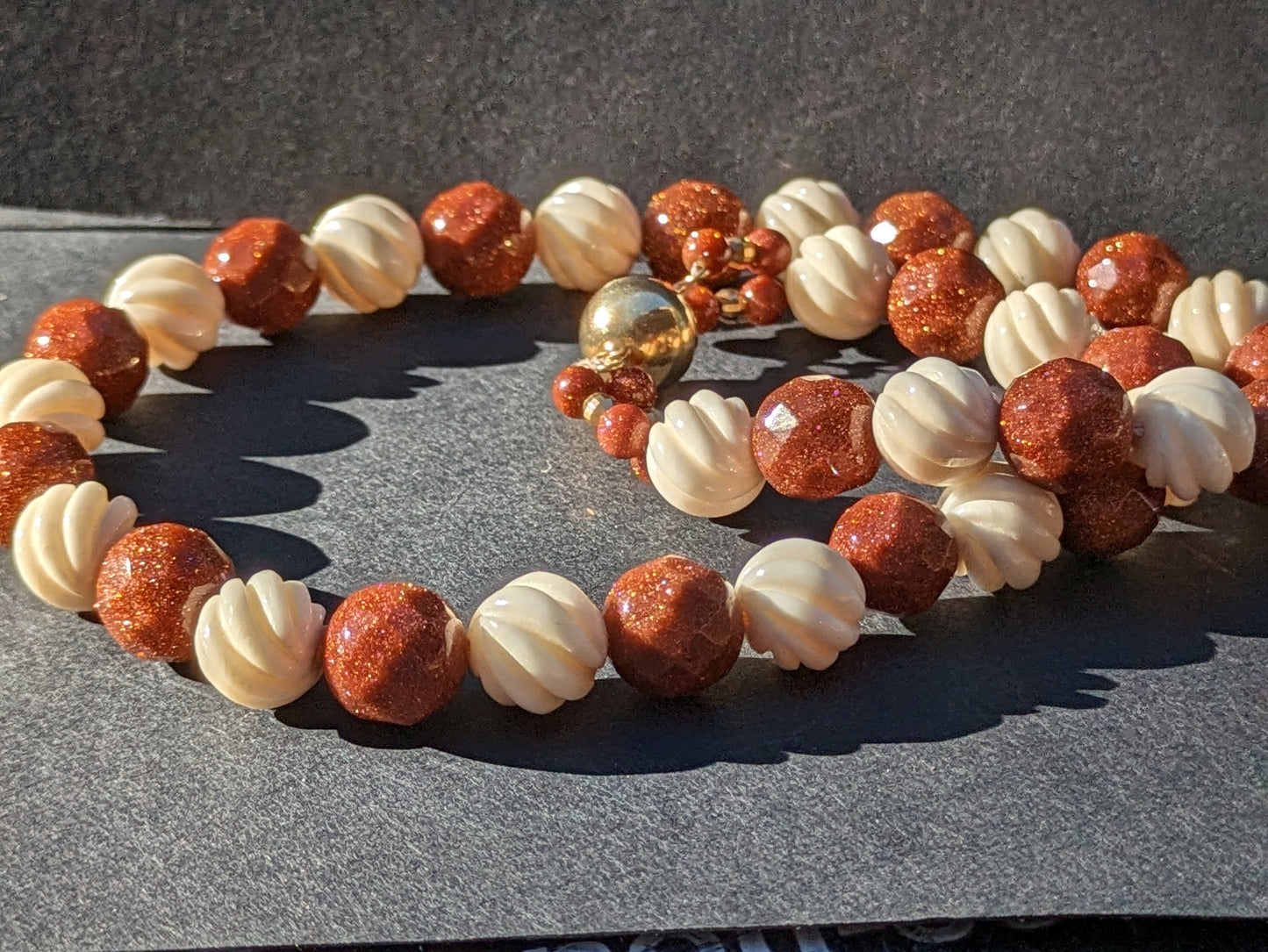 Goldstone and Carved bone Bead Necklace