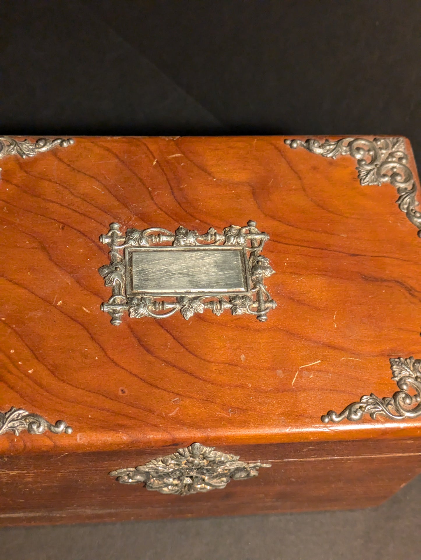 Wood jewelry box with silver decoration