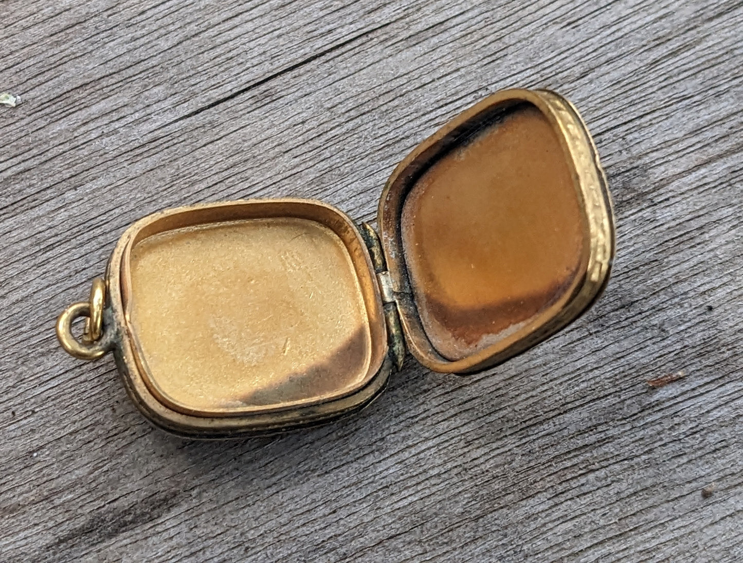 10K yellow gold locket with ruby and split pearl accents