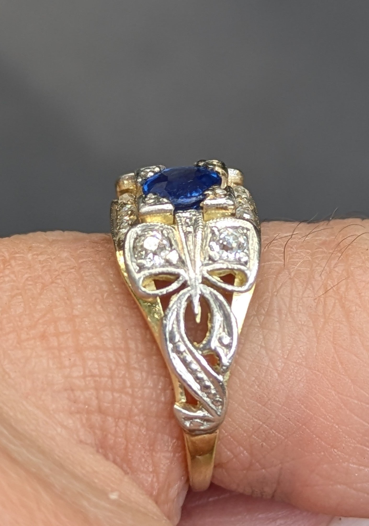 Platinum, 18k, Diamond and Sapphire Ring with Bow Details