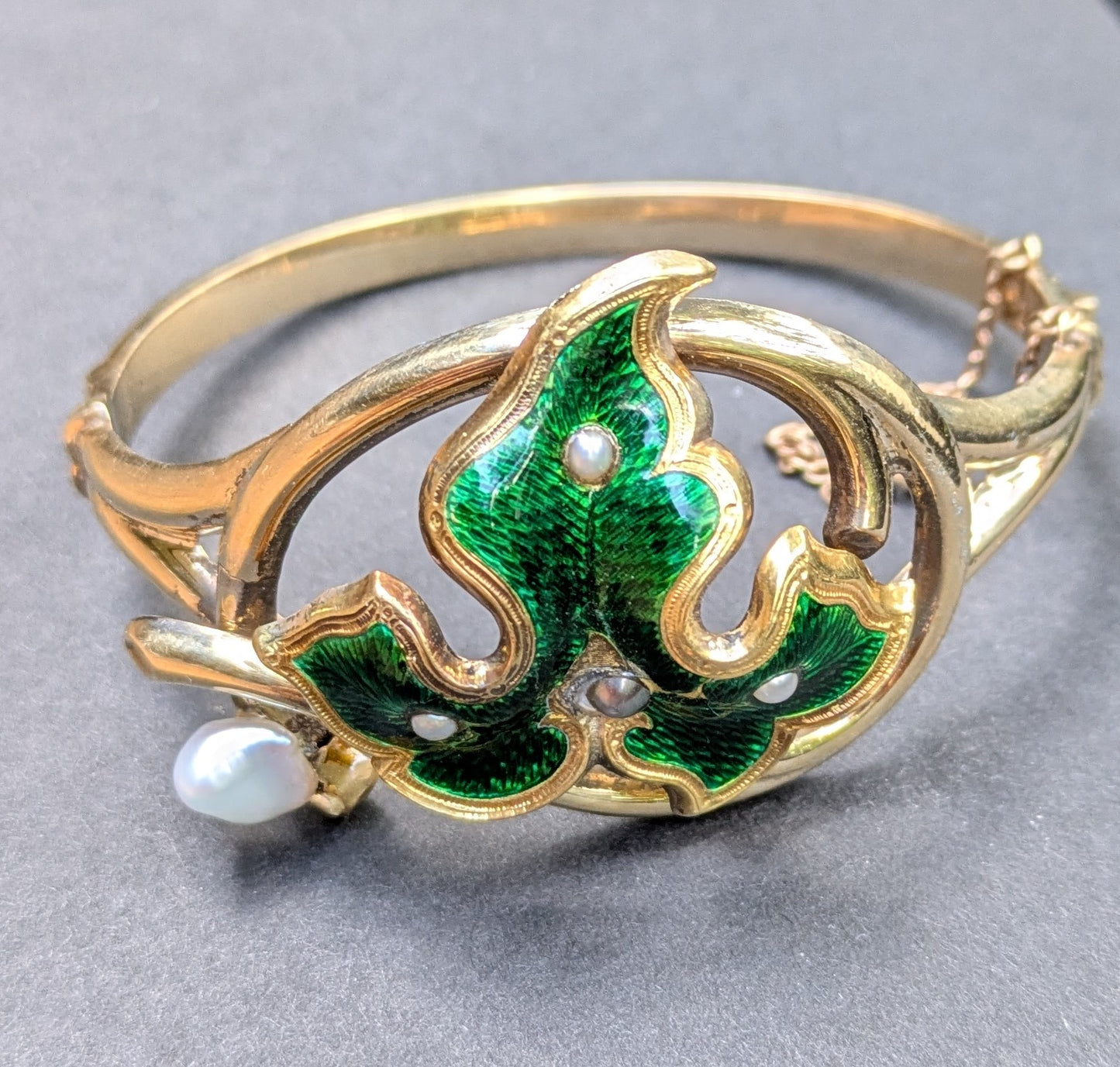 Early 1900's 14k Hinge Bangle Bracelet with Green Enamel and Seed Pearl