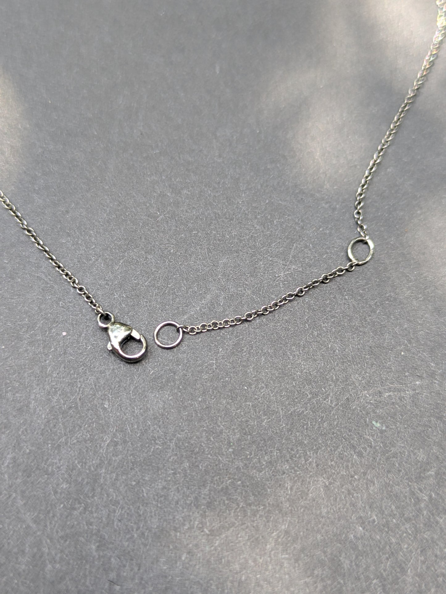 18k white gold oxidized chain w/ 1ct pear diamond