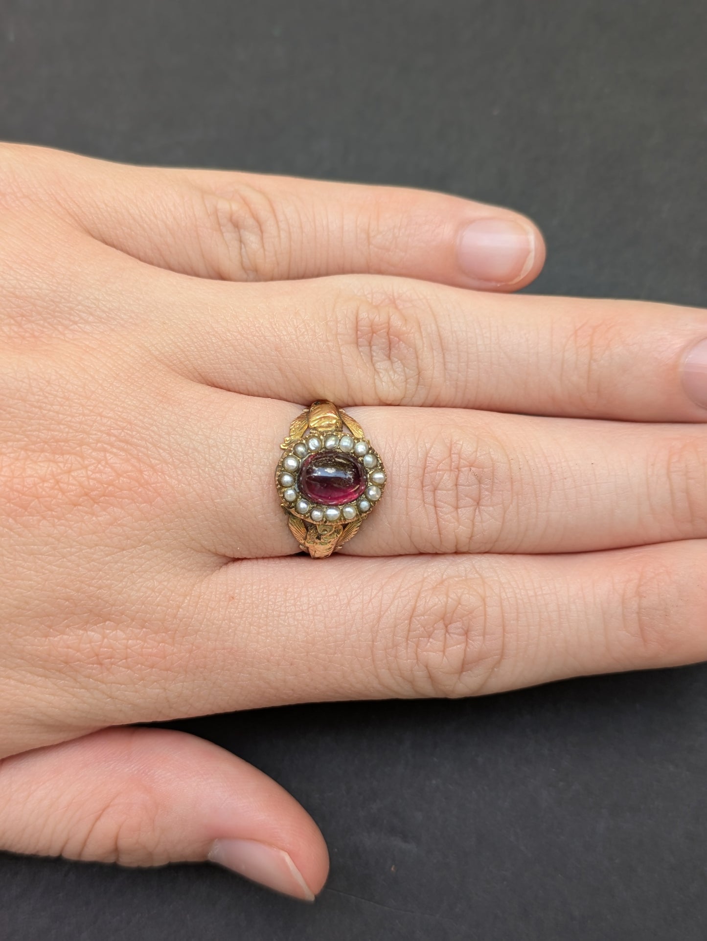 Foil Backed Garnet and Seed Pearl Ring with Floral Shoulders