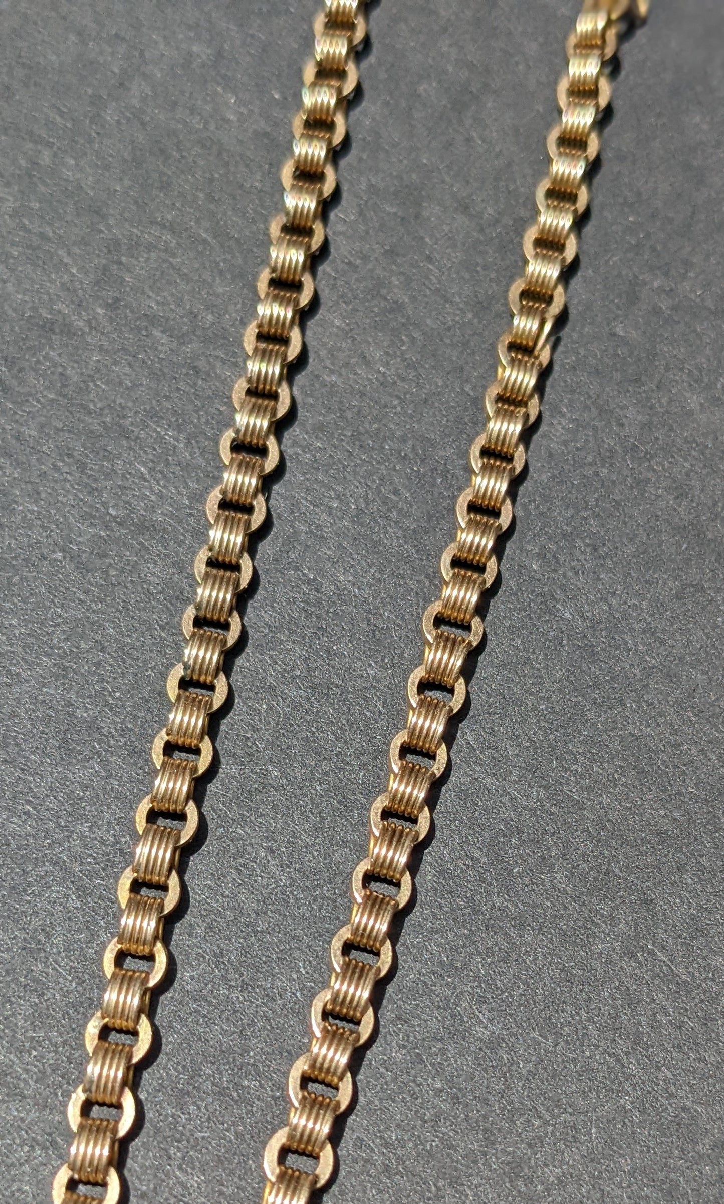 Elaborate 14kt chain necklace with pearl and enamel slide and tassels