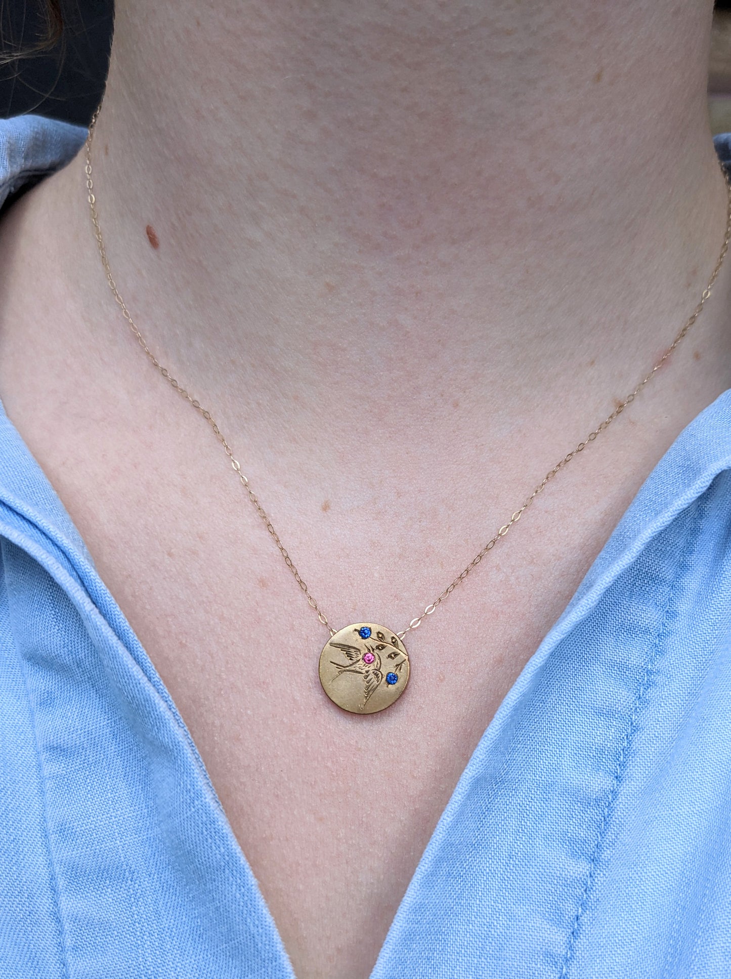 Engraved swallow necklace with sapphires inset