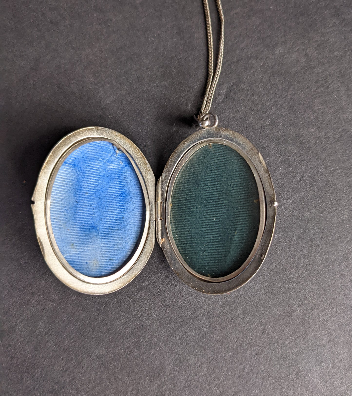 Large silver locket with enamel rose and monogram