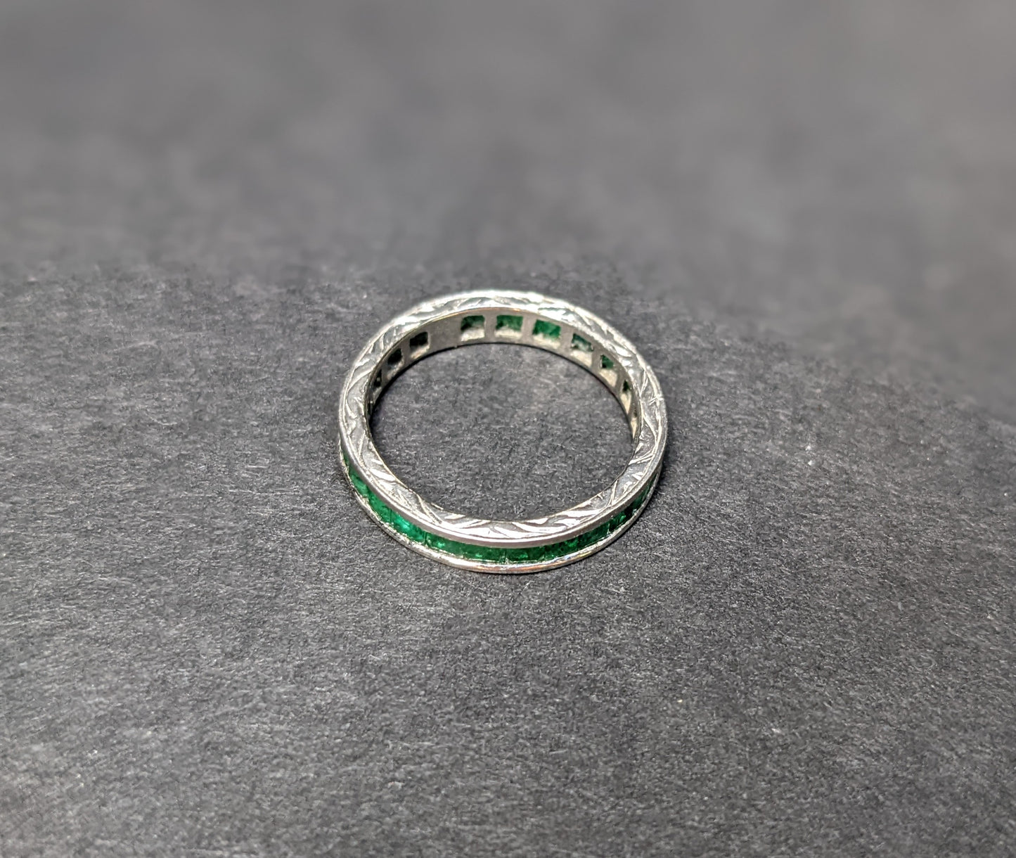Emerald and platinum eternity band