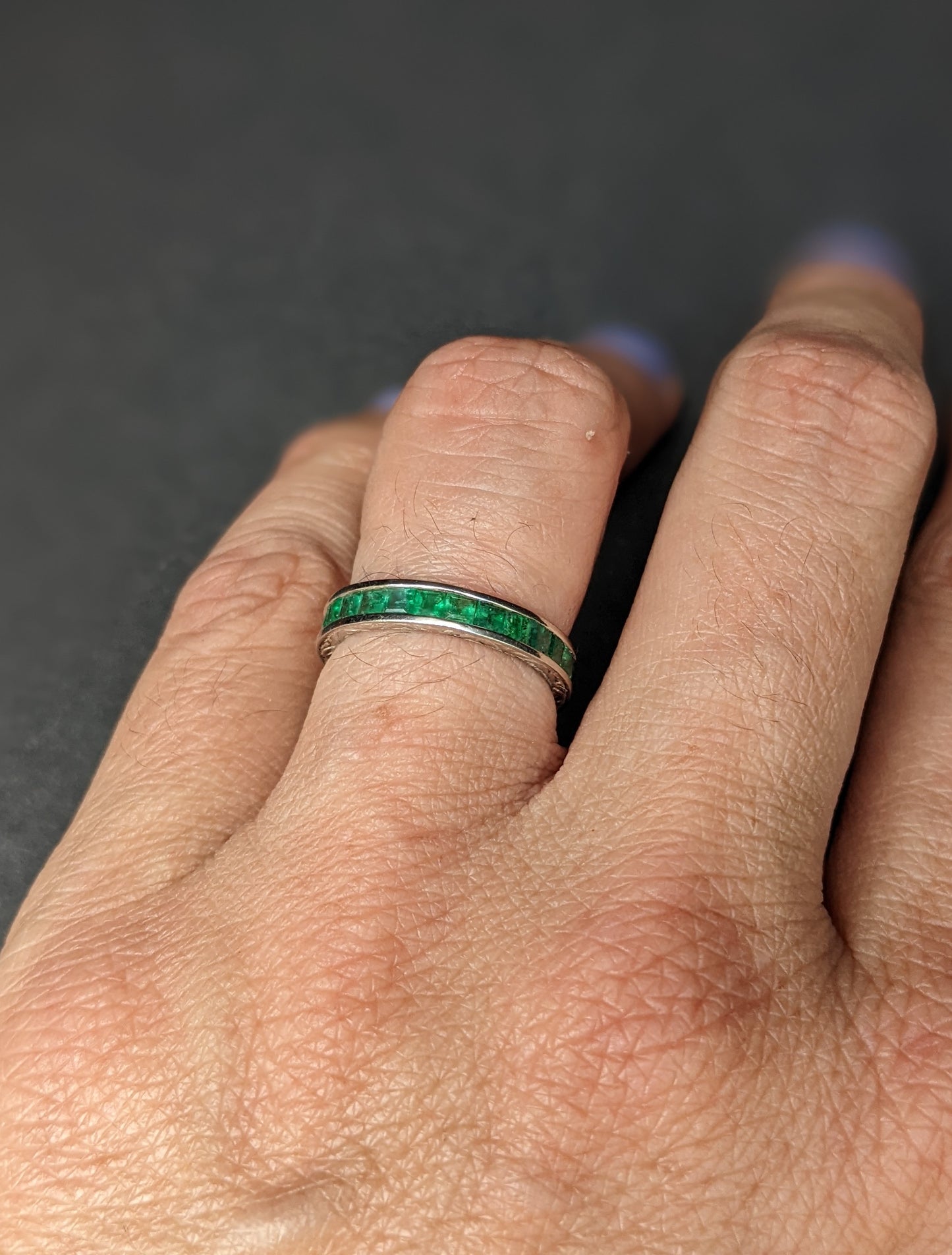 Emerald and platinum eternity band