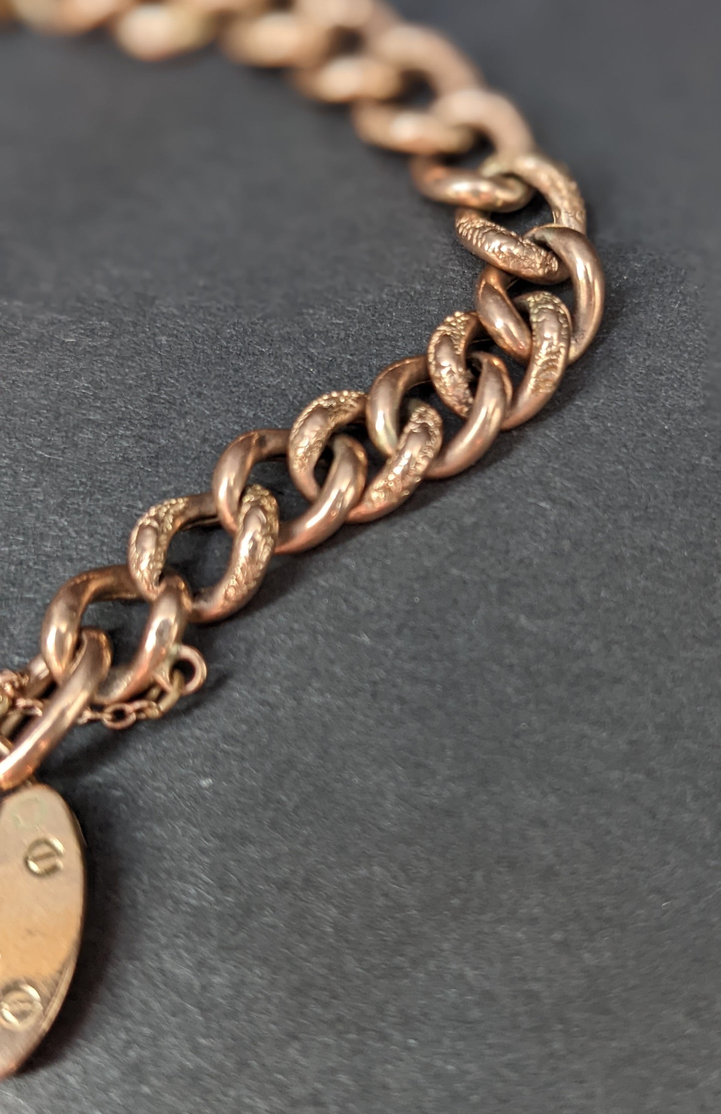 Rose gold curb chain bracelet with heart padlock