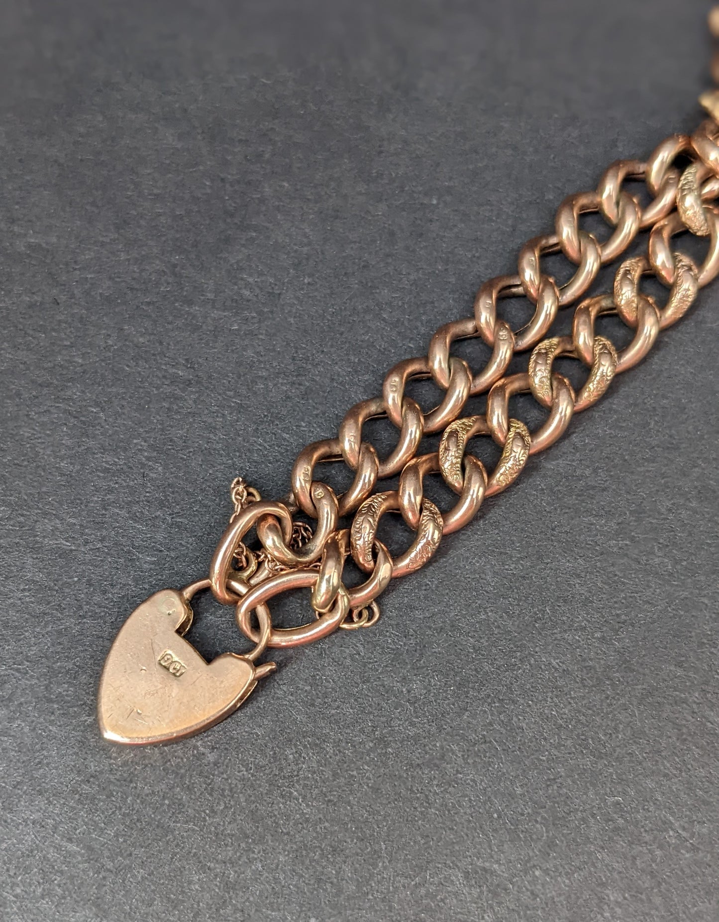 Rose gold curb chain bracelet with heart padlock