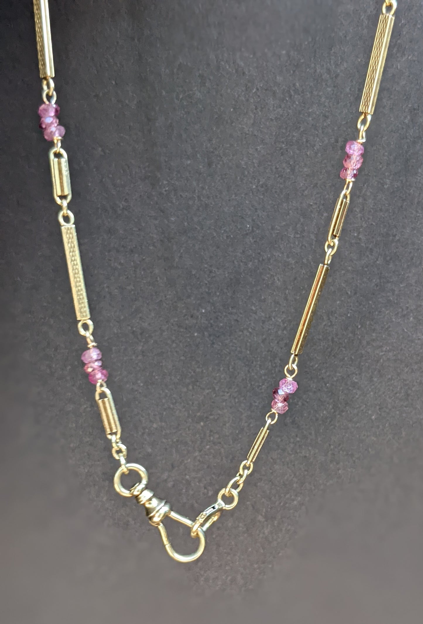 Yellow gold watch chain with pink sapphire additions