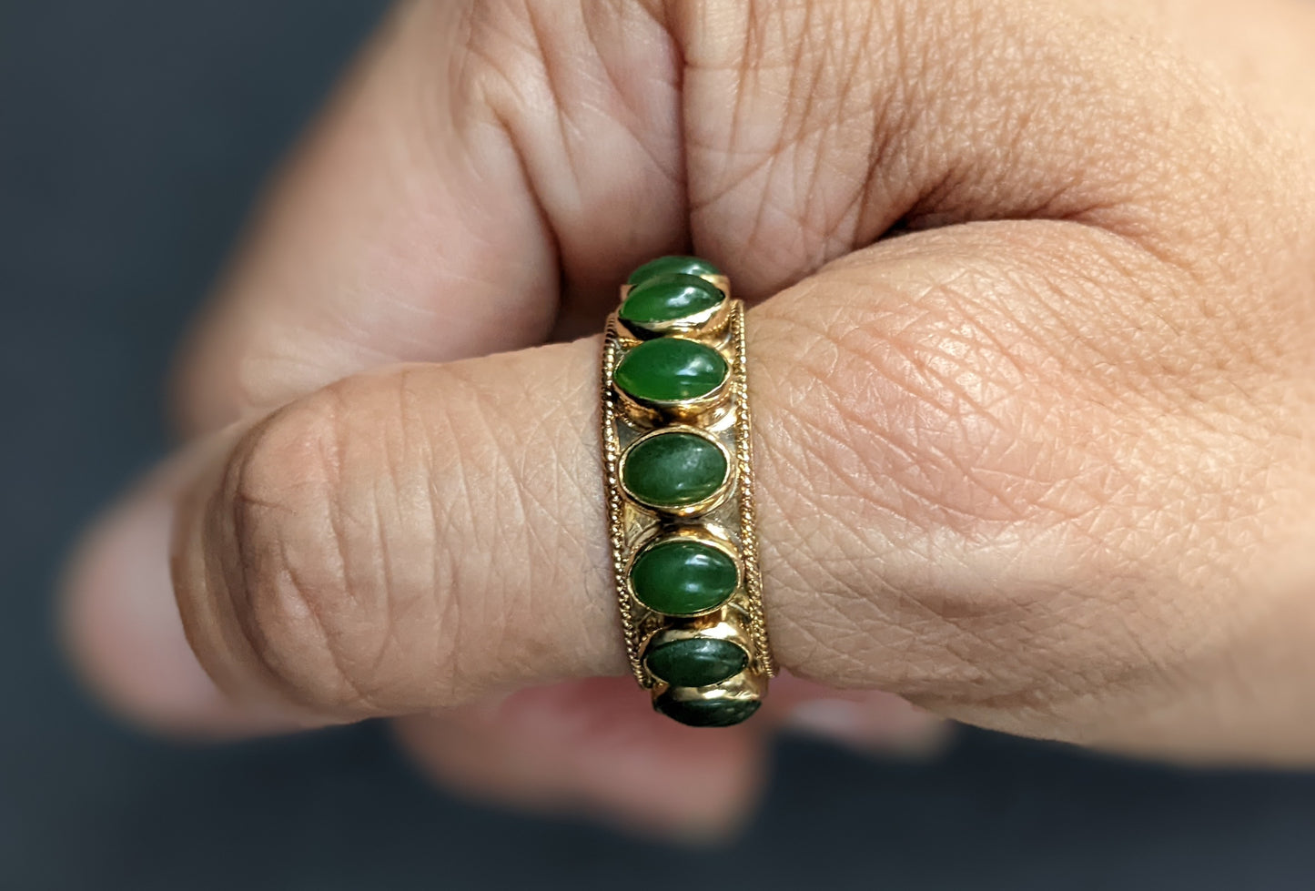 Wide bezel set jade eternity band