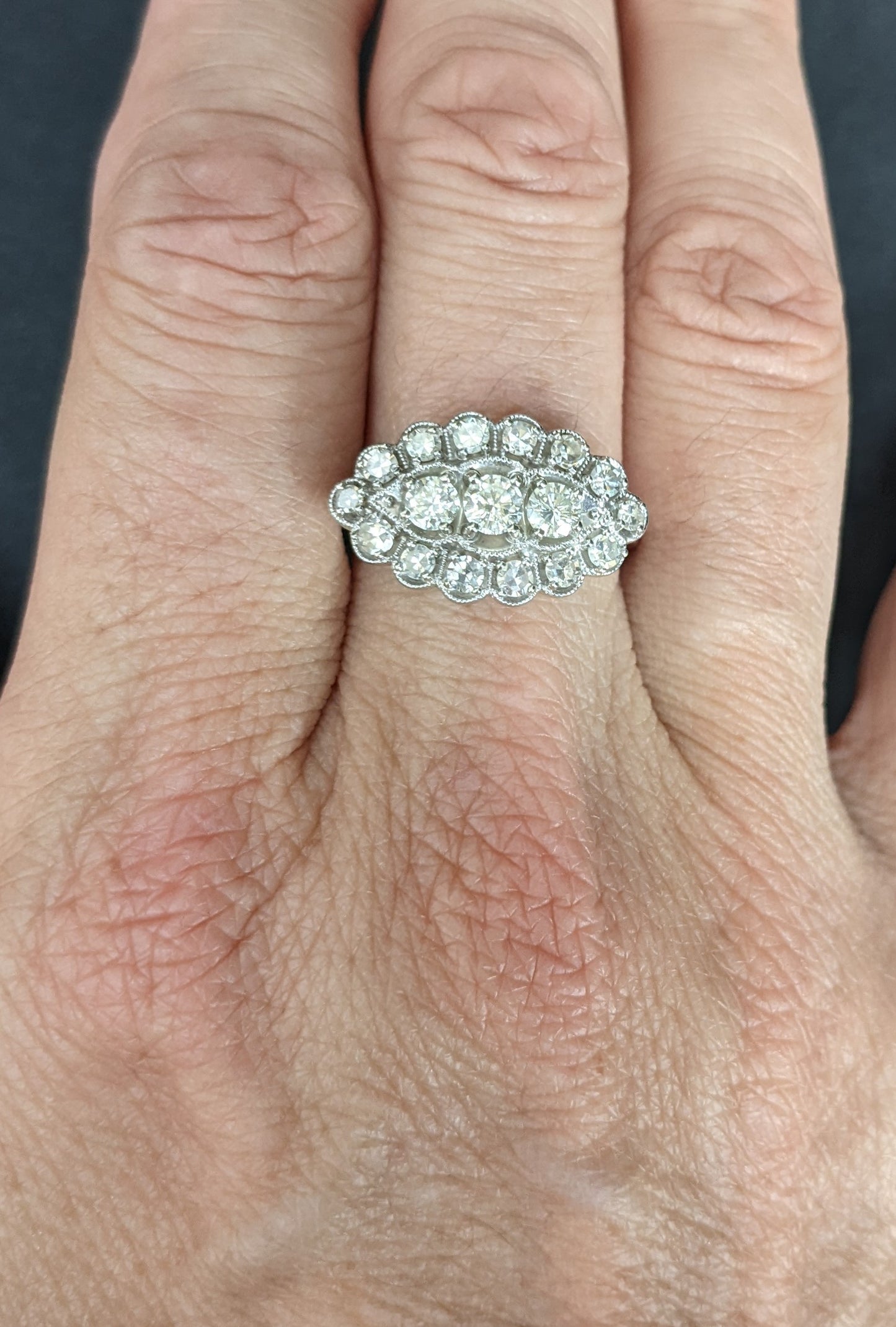 Vintage diamond cluster ring with milgrain