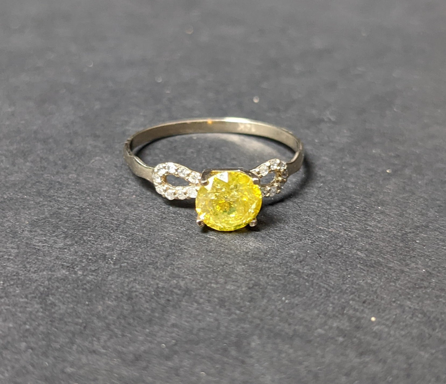 Yellow sapphire and white diamond ring