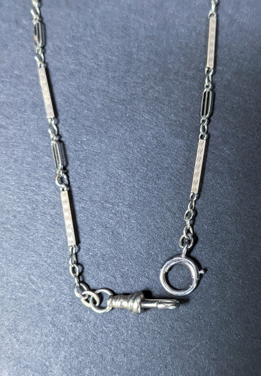 White gold watch chain with dog clip and large c clasp