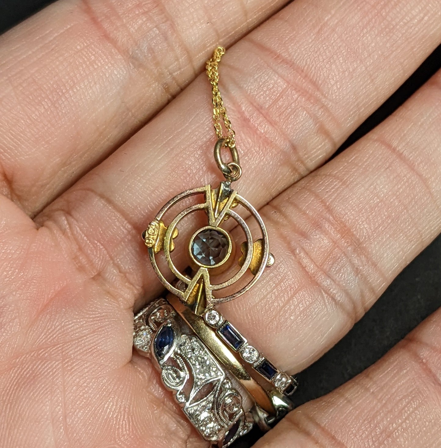 14kt chain with 14kt conversion blue zircon and half pearl pendant