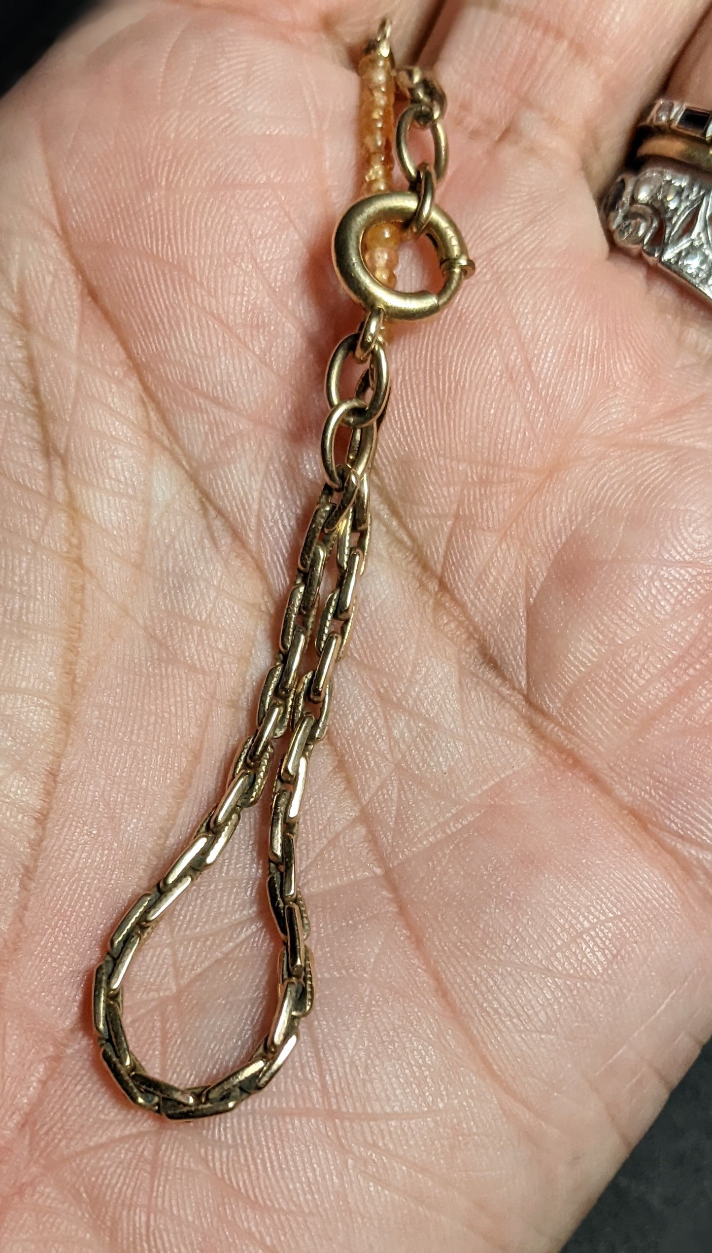 14k Gold watch chain with large bolt clasp and orange sapphire additions