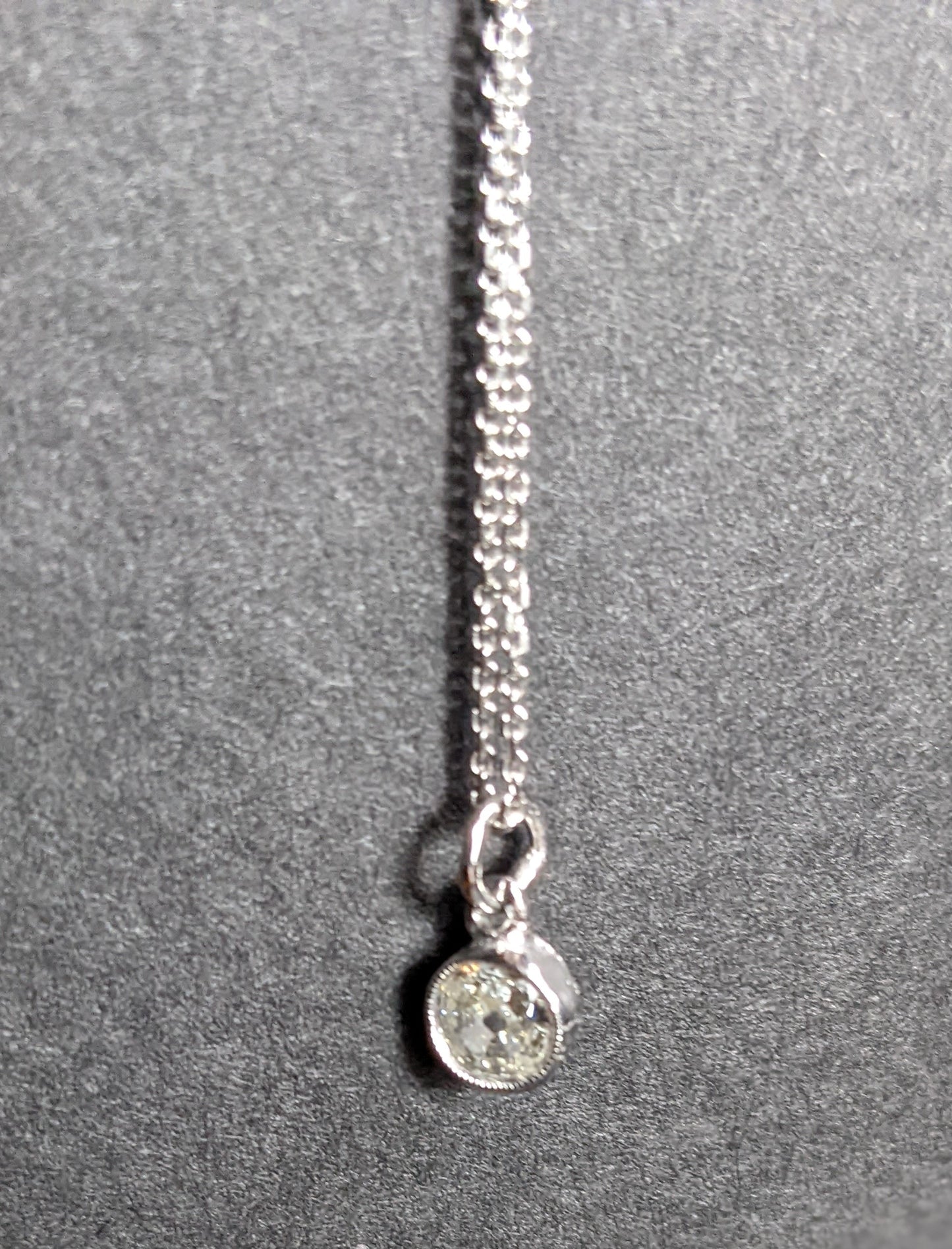 Old European cut diamond in original bezel on 14k white gold chain