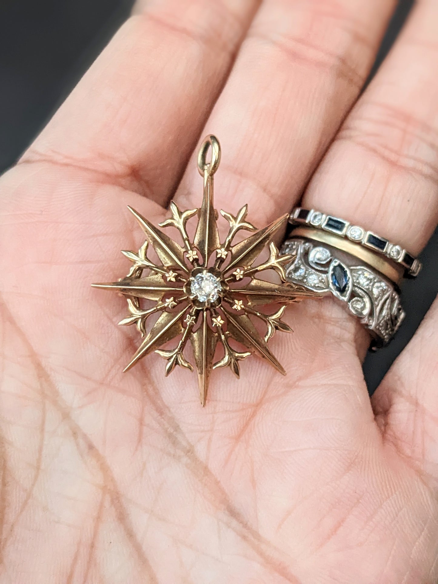 14k Diamond starburst pin/ pendant.