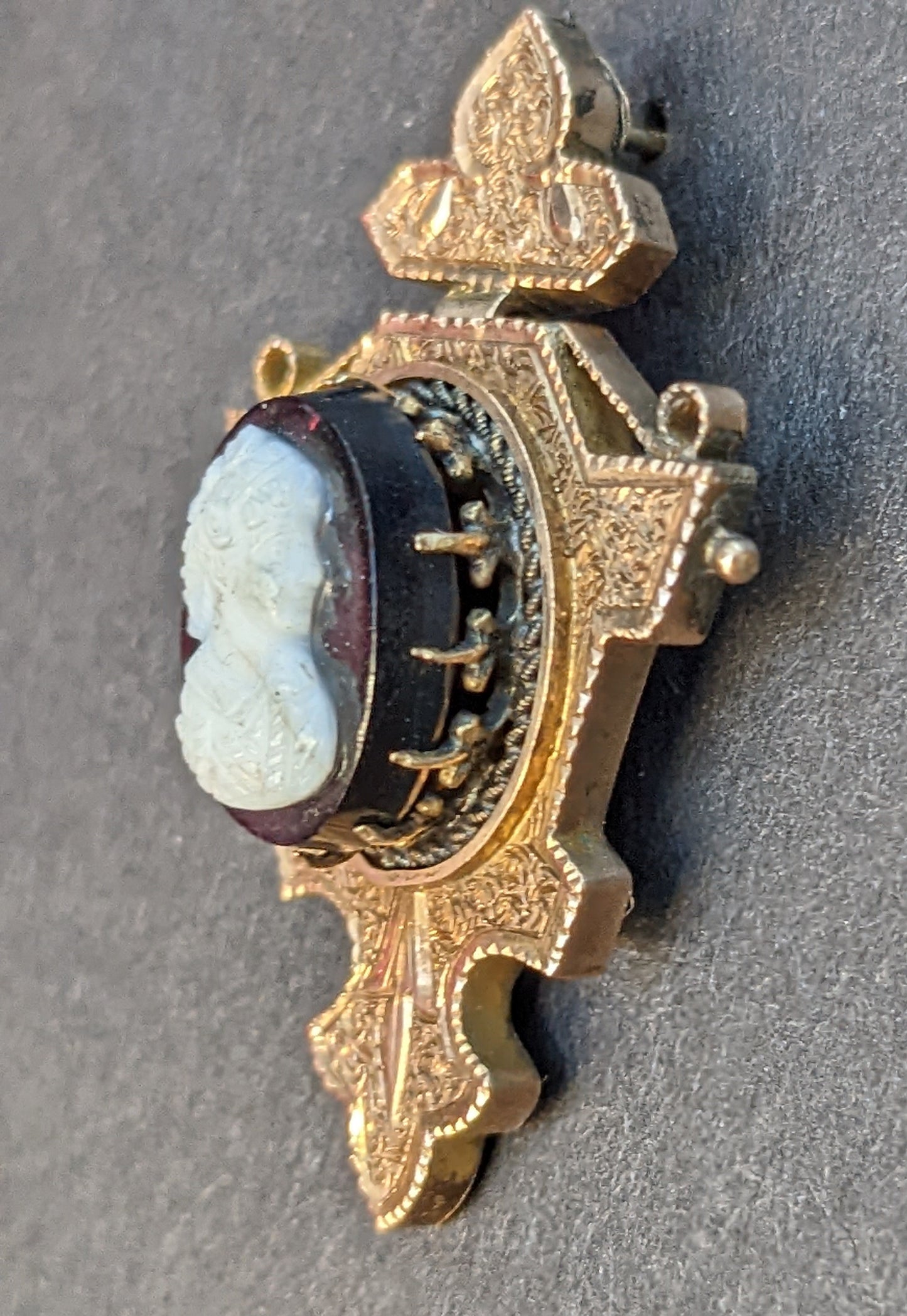 Low carat cameo on black, Victorian earrings with 14Kt gold posts