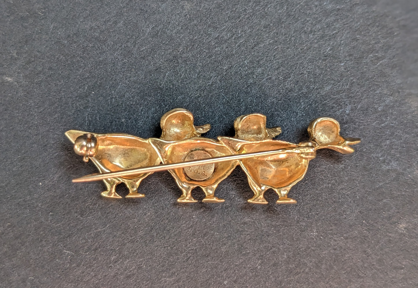 Ducks in A Row Brooch with Sapphire Eyes