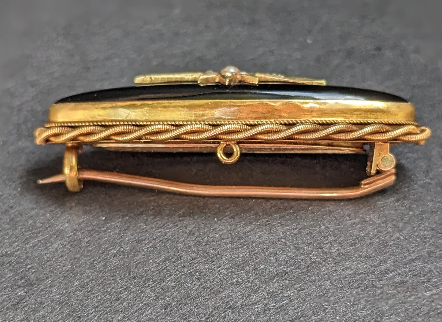 Long Oval 12Kt Onyx Mourning Brooch with Braid and Seed Pearl Starburst