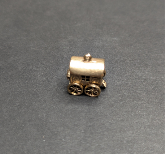 14kt Movable Charm Wagon Which Opens to Women at Table