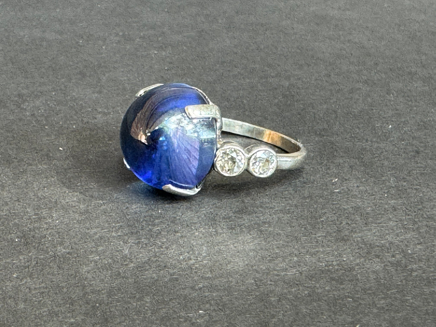 Platinum 1920s Art Deco Sapphire Cabochon with Mine Cut Diamonds