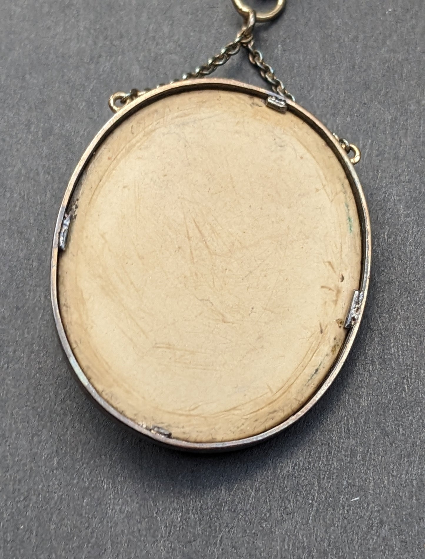 Carved lava cameo necklace. Barrel clasp