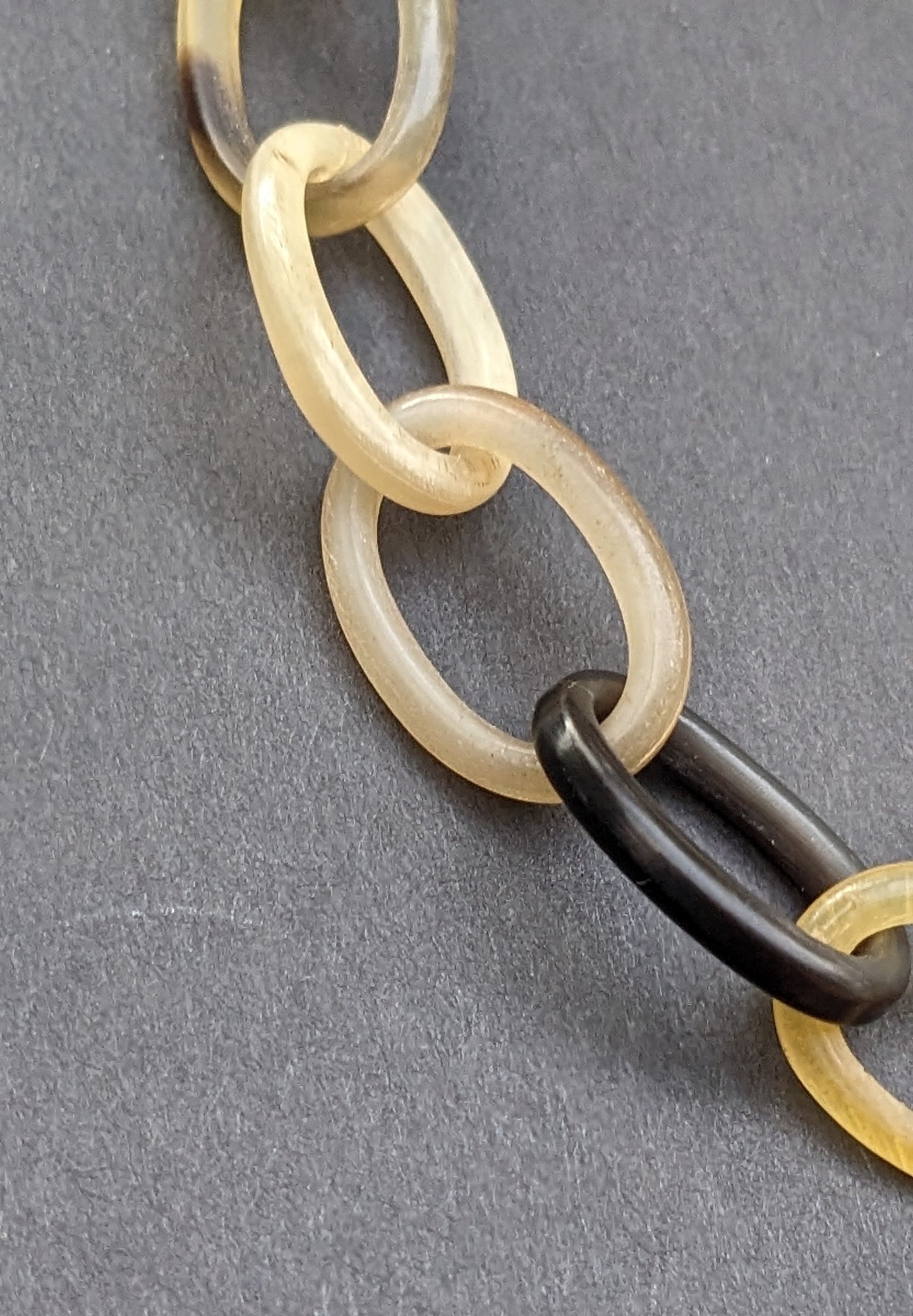 Carved longhorn chain with sterling and gold connector clasp