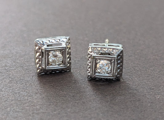 Square mounted round Diamond stud earrings