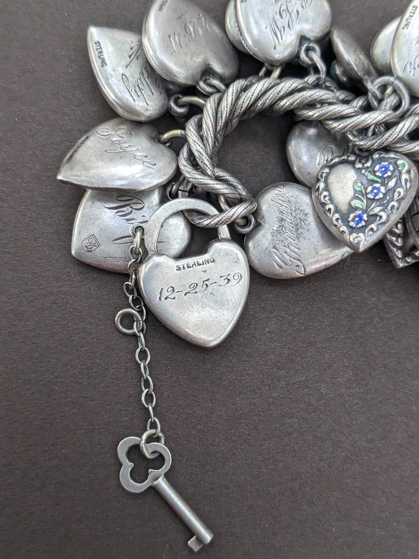 Amazing sterling puffy heart bracelet on patterned curb with heart & key clasp