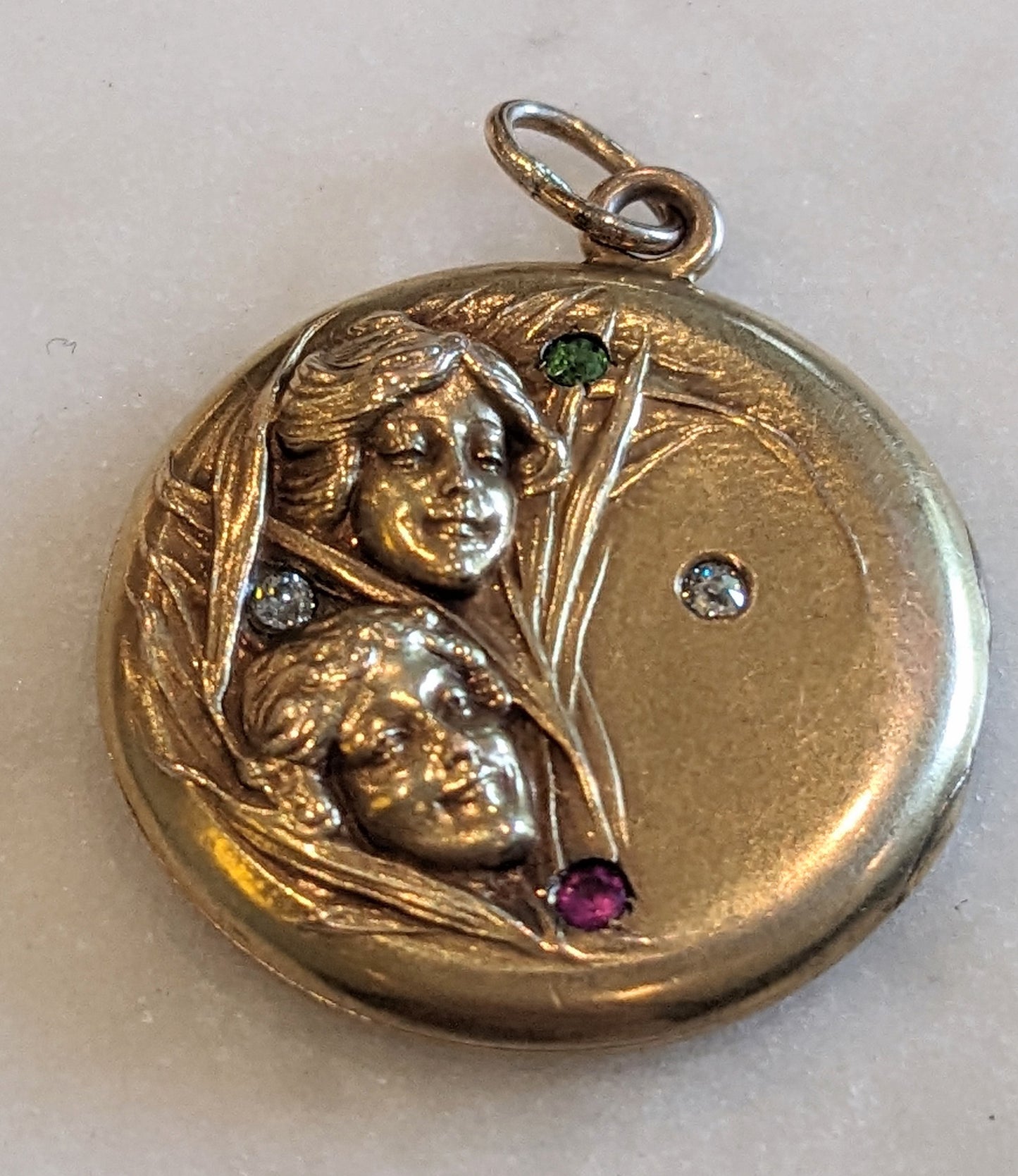 Art Nouveau repousse locket