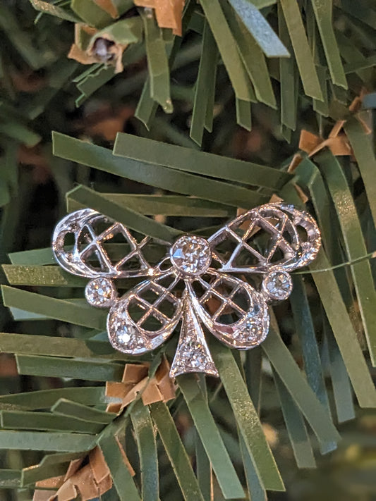 14k white gold and diamond butterfly pendant