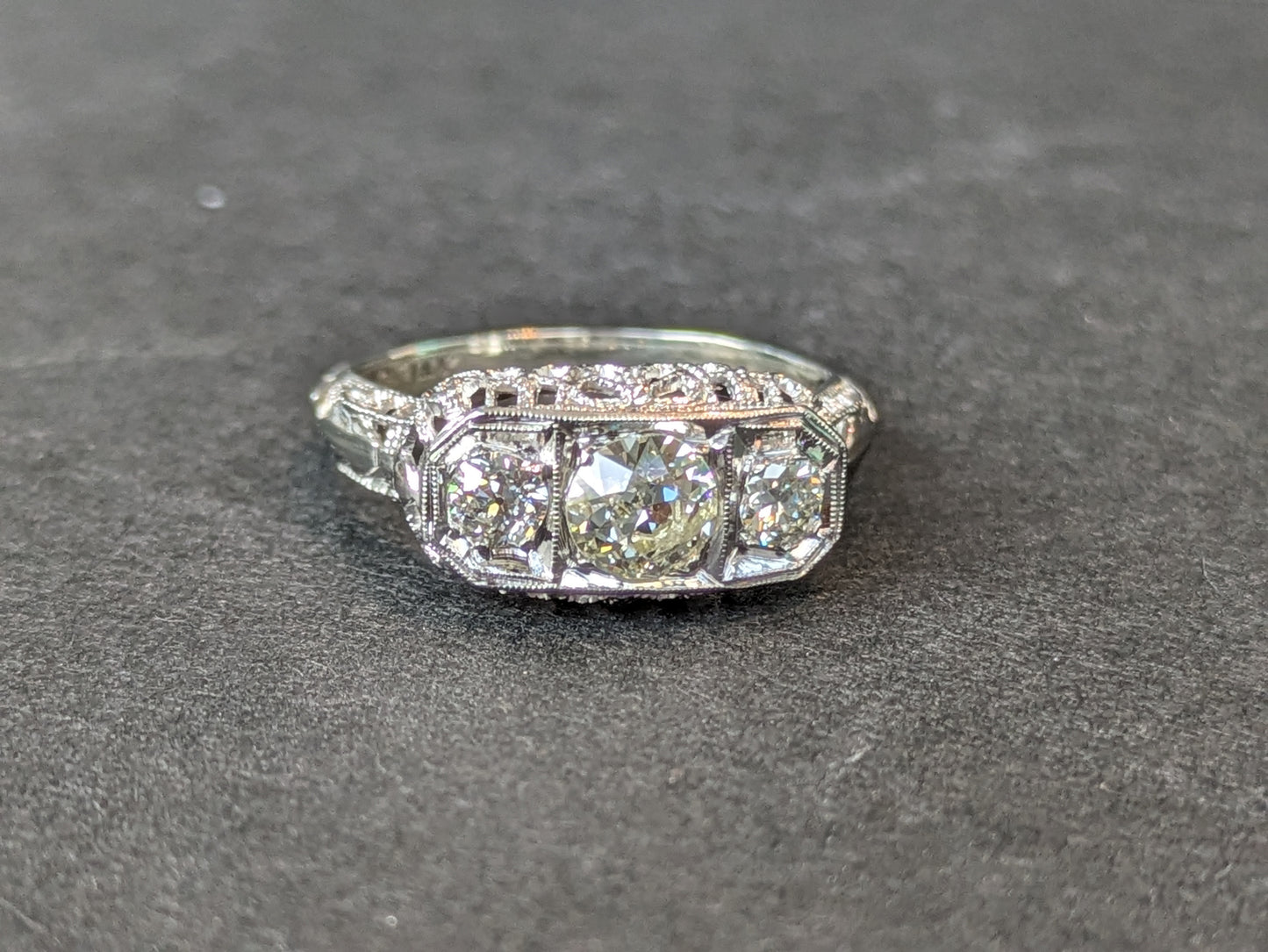 Edwardian white gold filigree 3 stone Old European Cut diamond ring