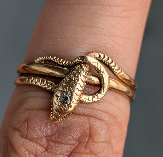 14k snake ring with flush set diamond
