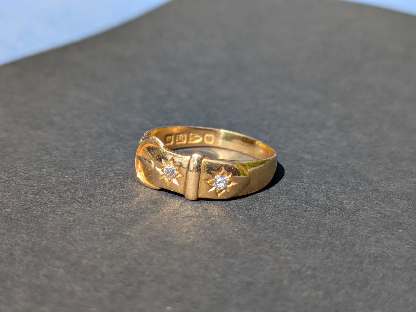18kt Buckle Ring with Mine cut diamonds