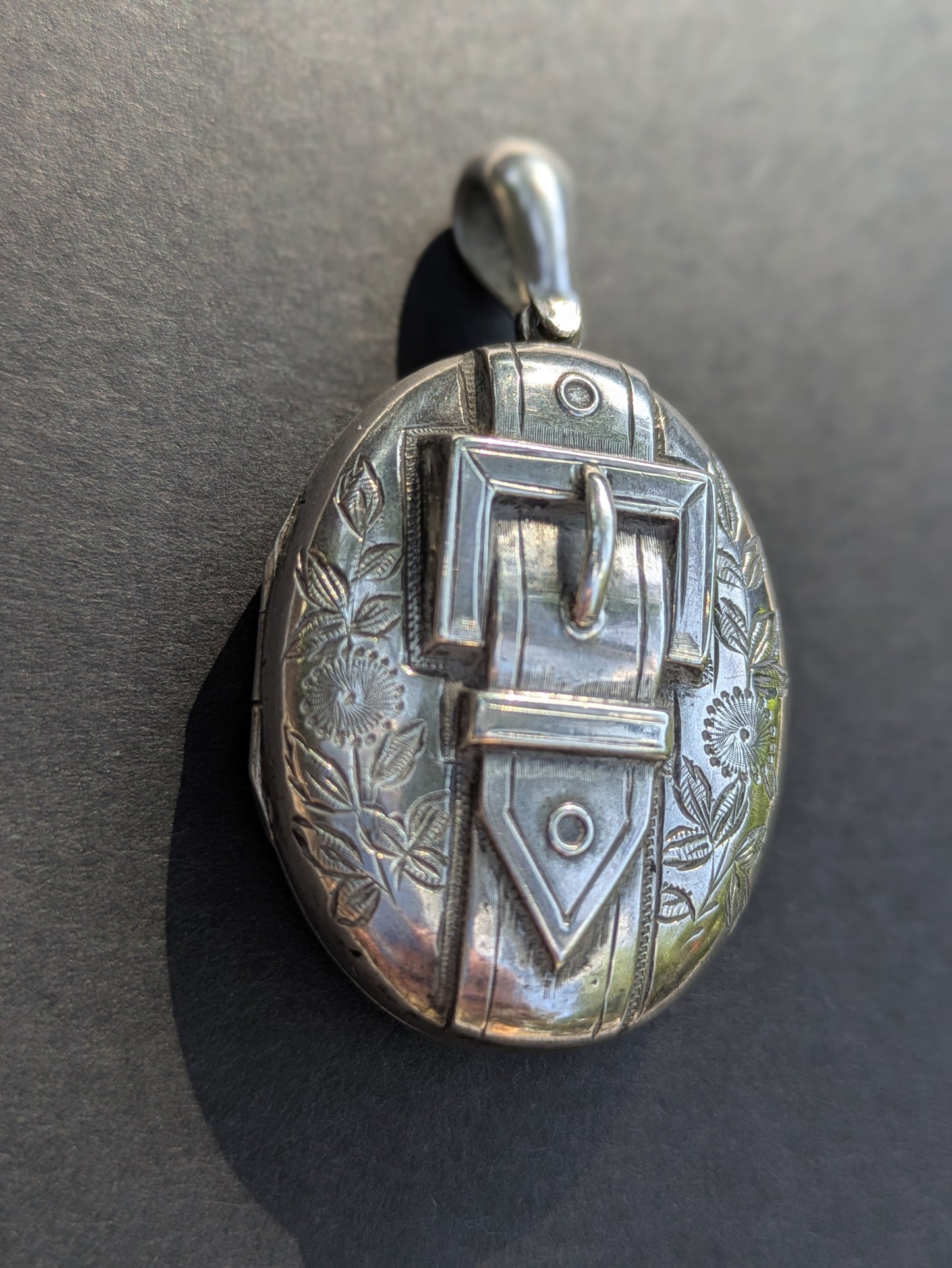 Sterling Locket with Buckle and Floral Engraving