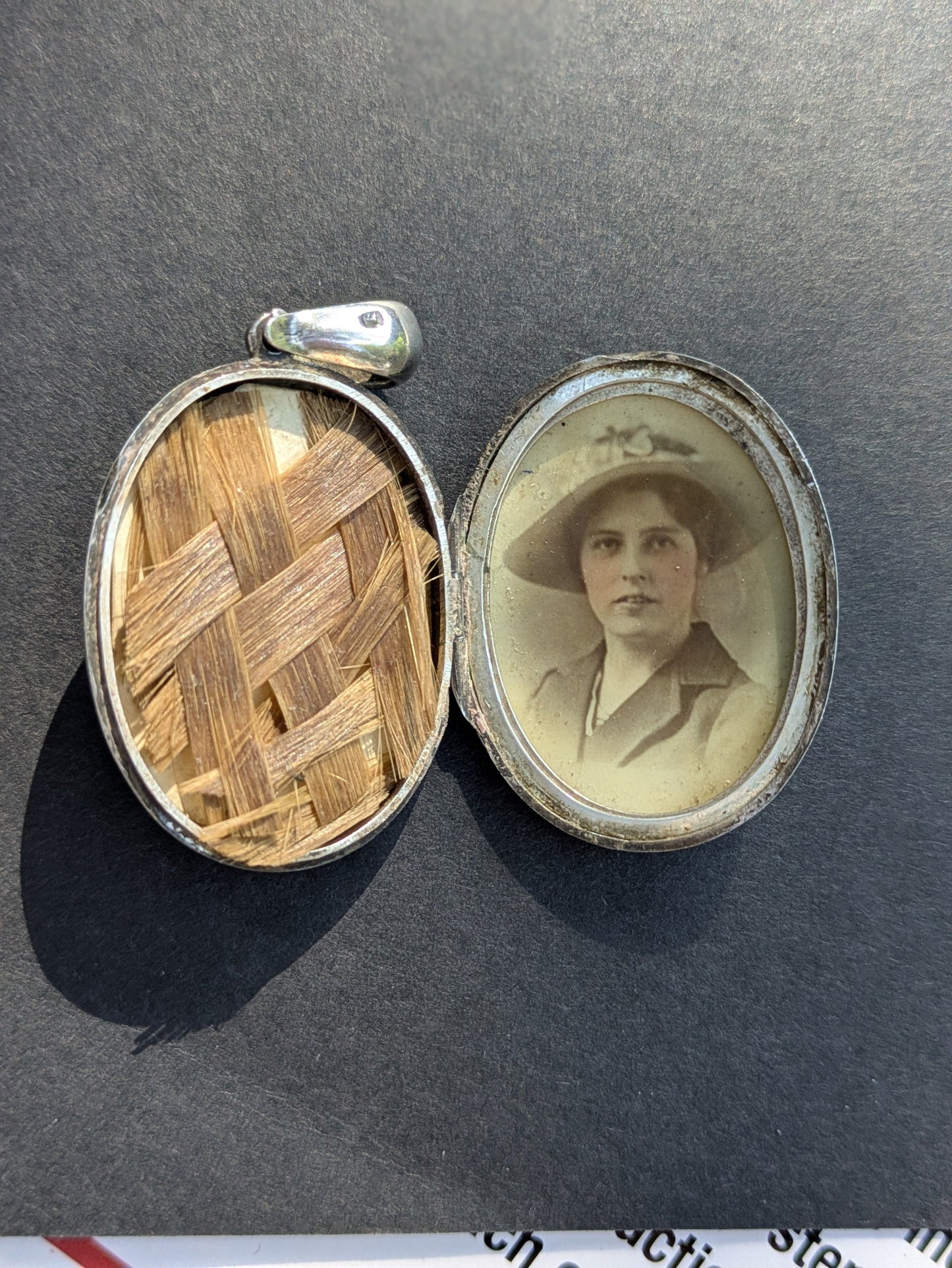 Sterling Locket with Buckle and Floral Engraving