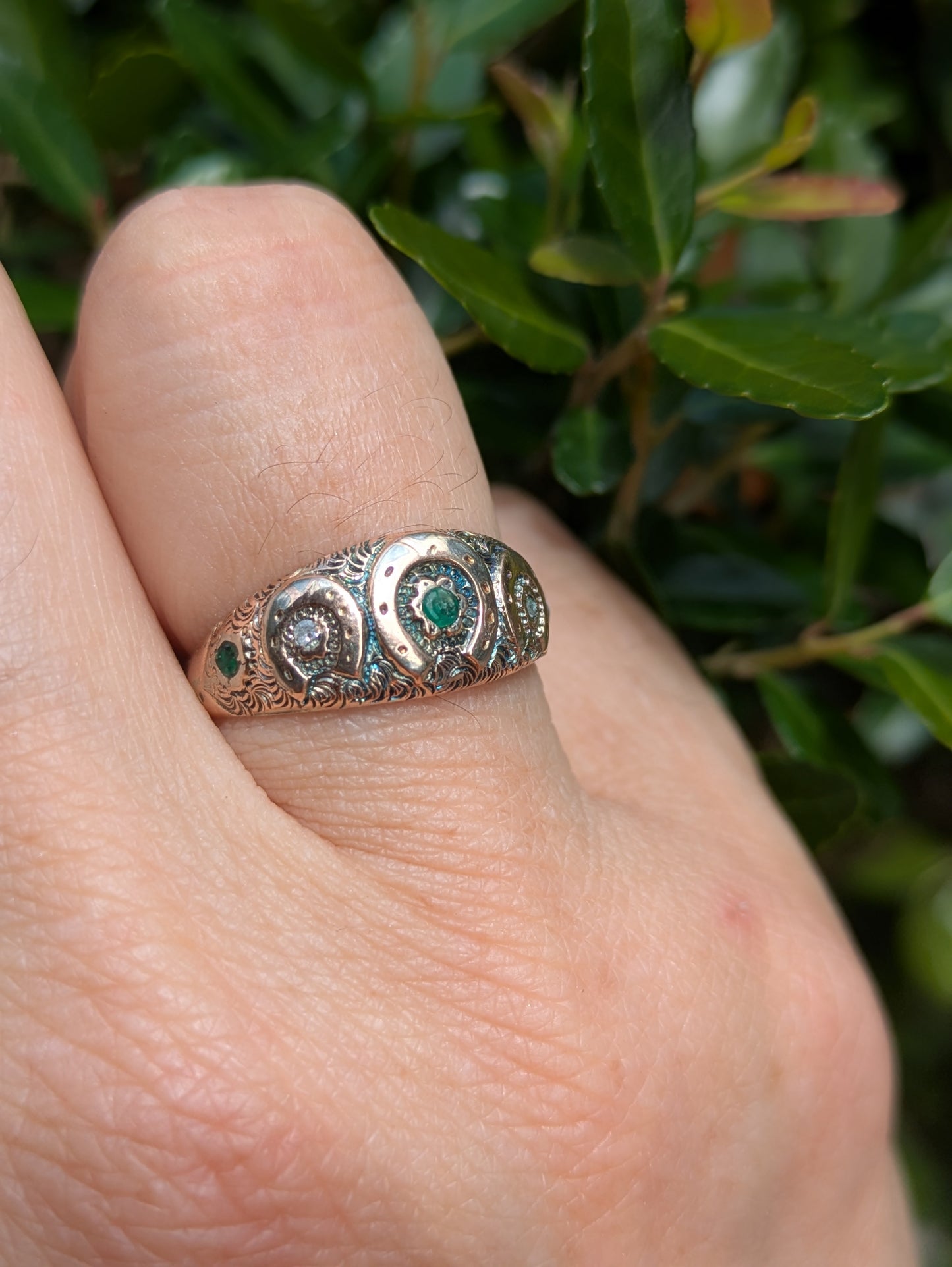 English 9k Horseshoe Repousse Ring with Emeralds