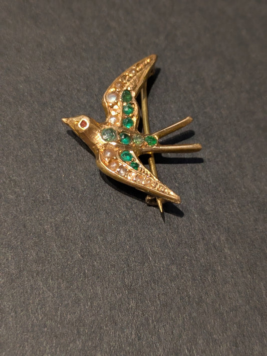 1915 14k Swallow Brooch set with Emerald and Seed Pearl