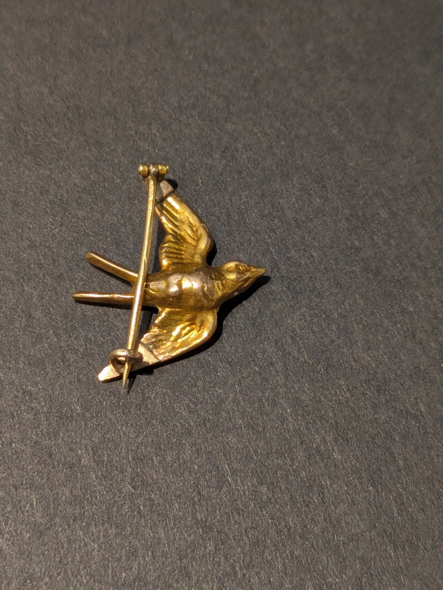 1915 14k Swallow Brooch set with Emerald and Seed Pearl