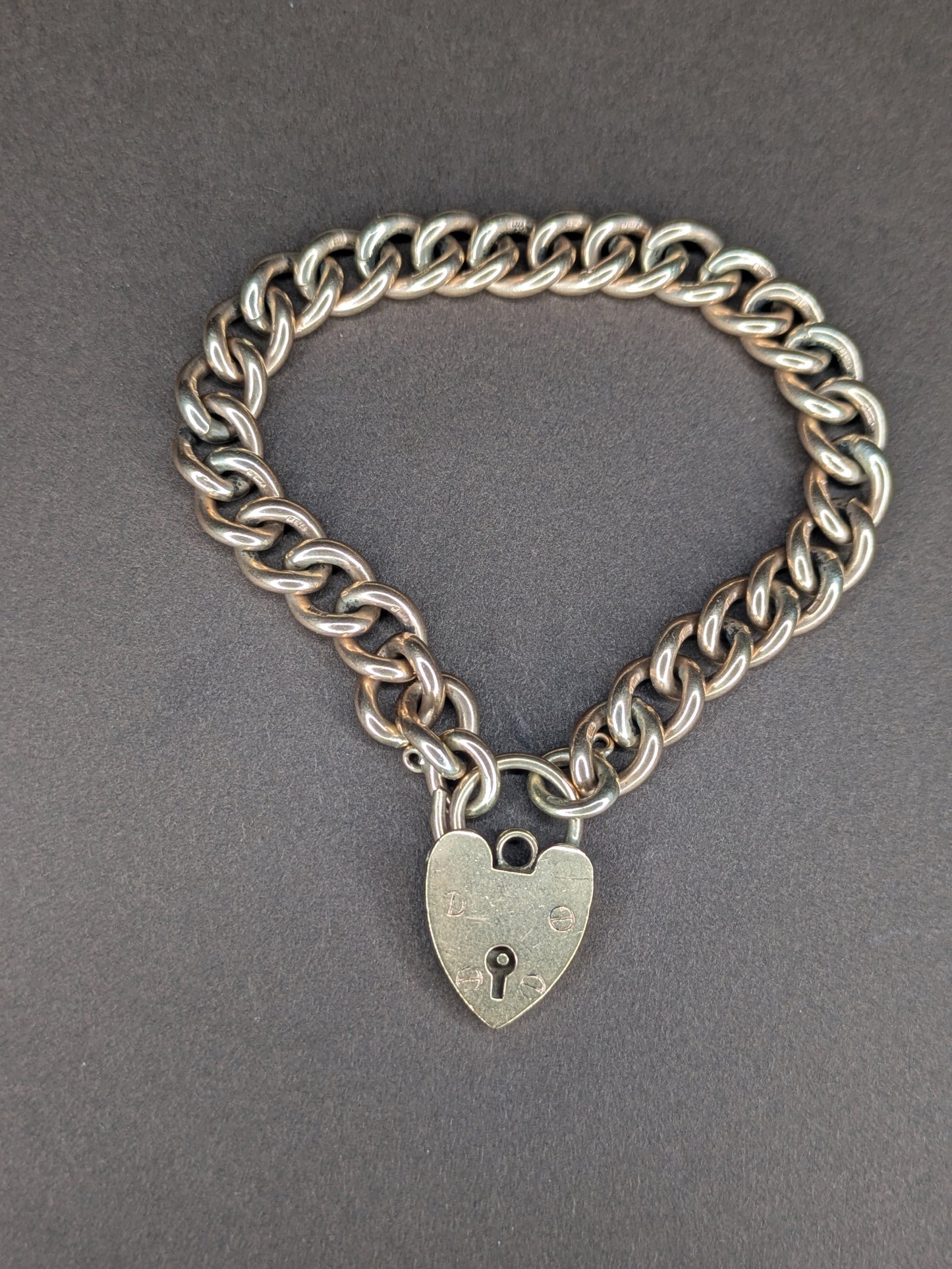 9k Solid Curb Chain Bracelet with Heart Lock Clasp Birmingham Hallmark