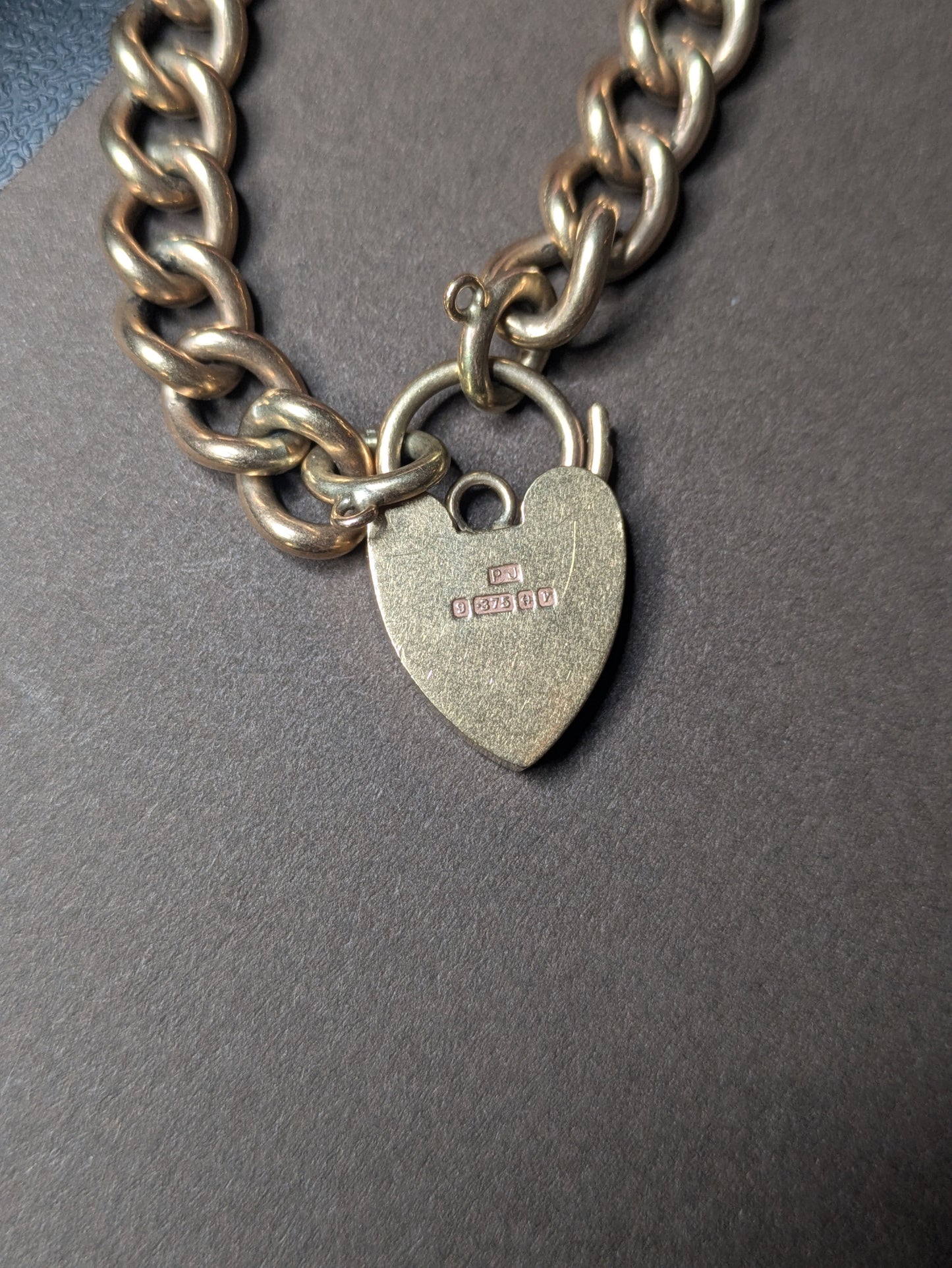 9k Solid Curb Chain Bracelet with Heart Lock Clasp Birmingham Hallmark