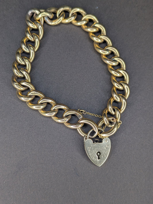 9k Yellow Gold Curb Chain Heart Lock Bracelet